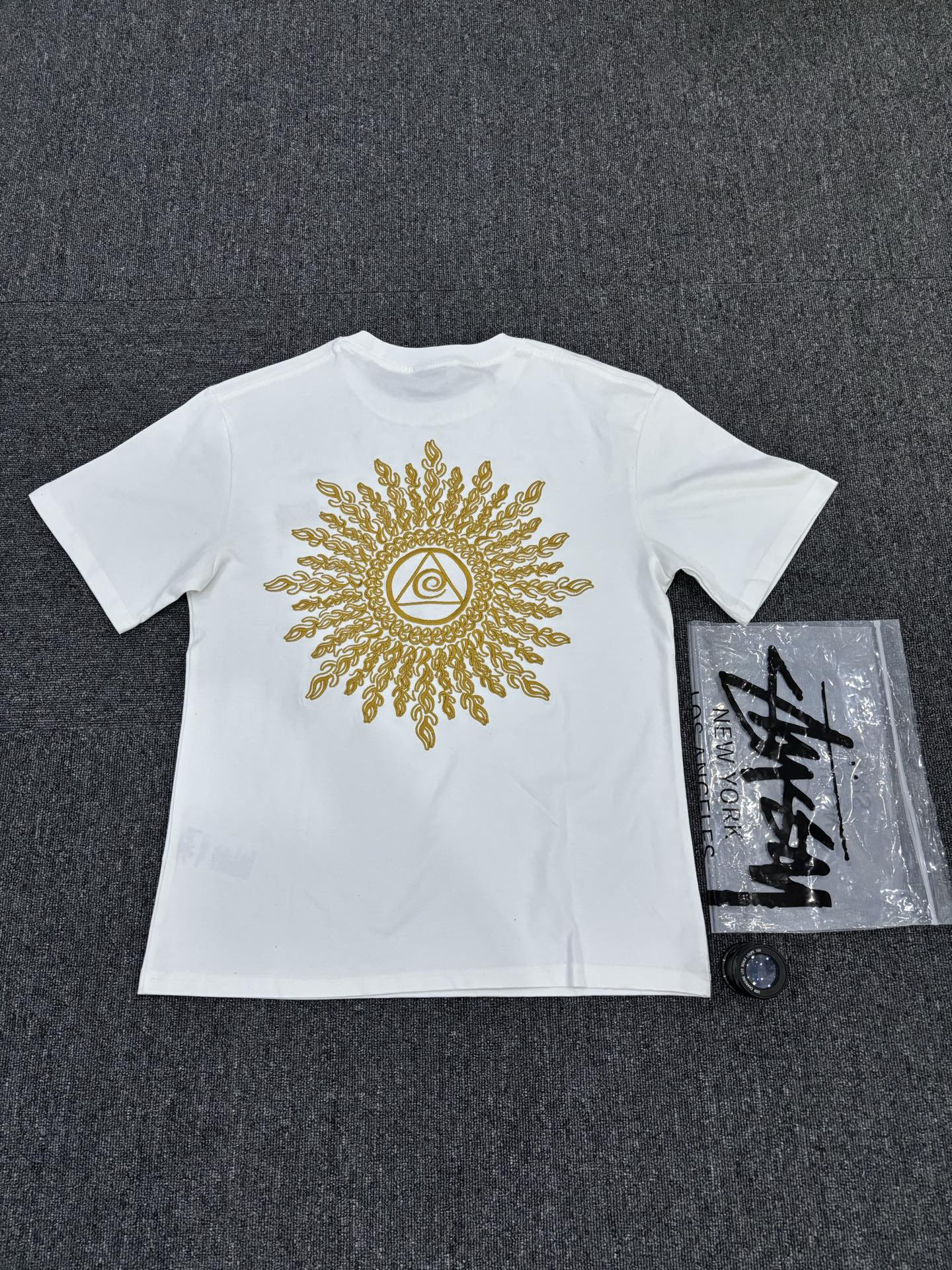 Stüssy White T-Shirt with Gold Chest Logo & Back Graphic