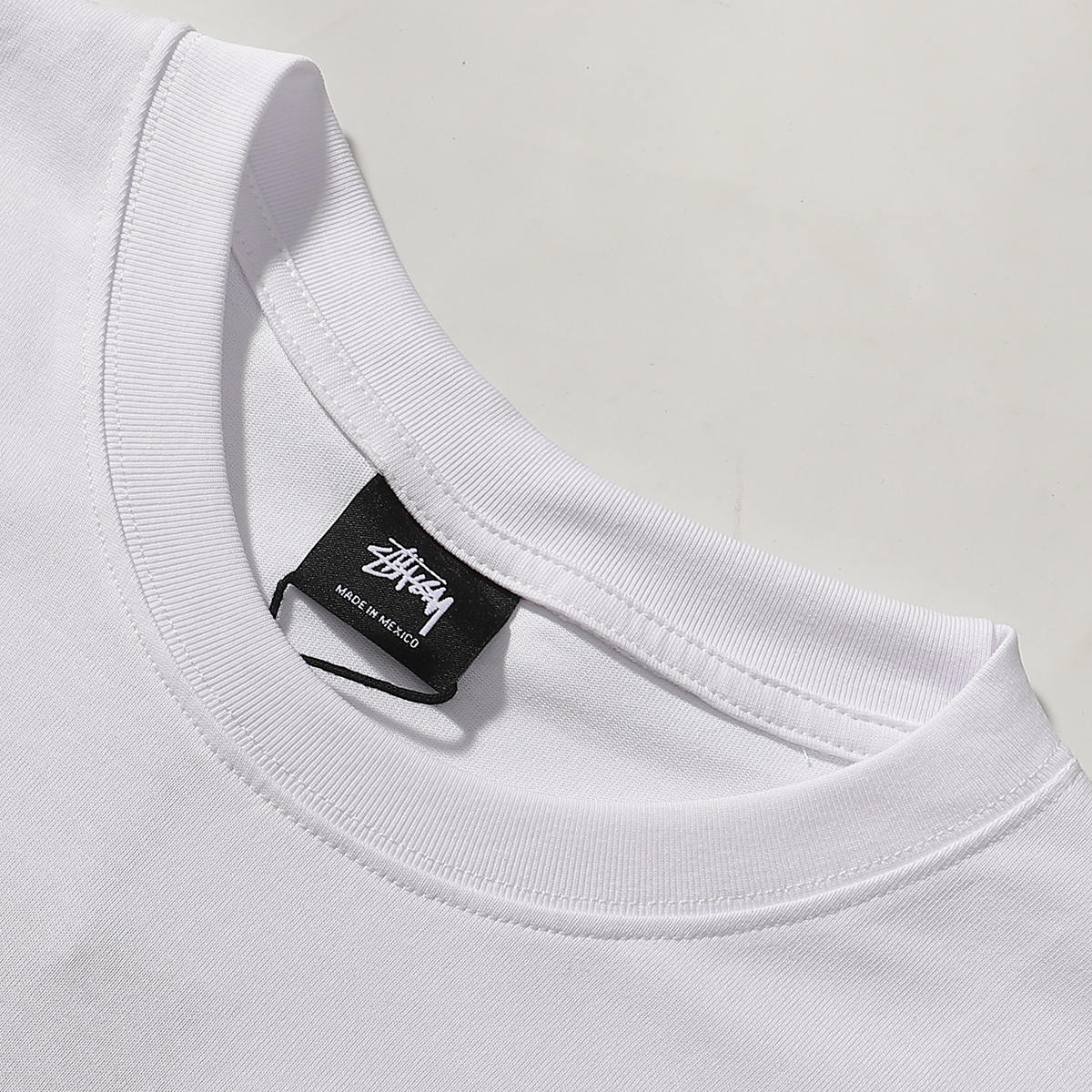 Stussy and Denim Tears Annie Lee Six No Uptown T-Shirt - White