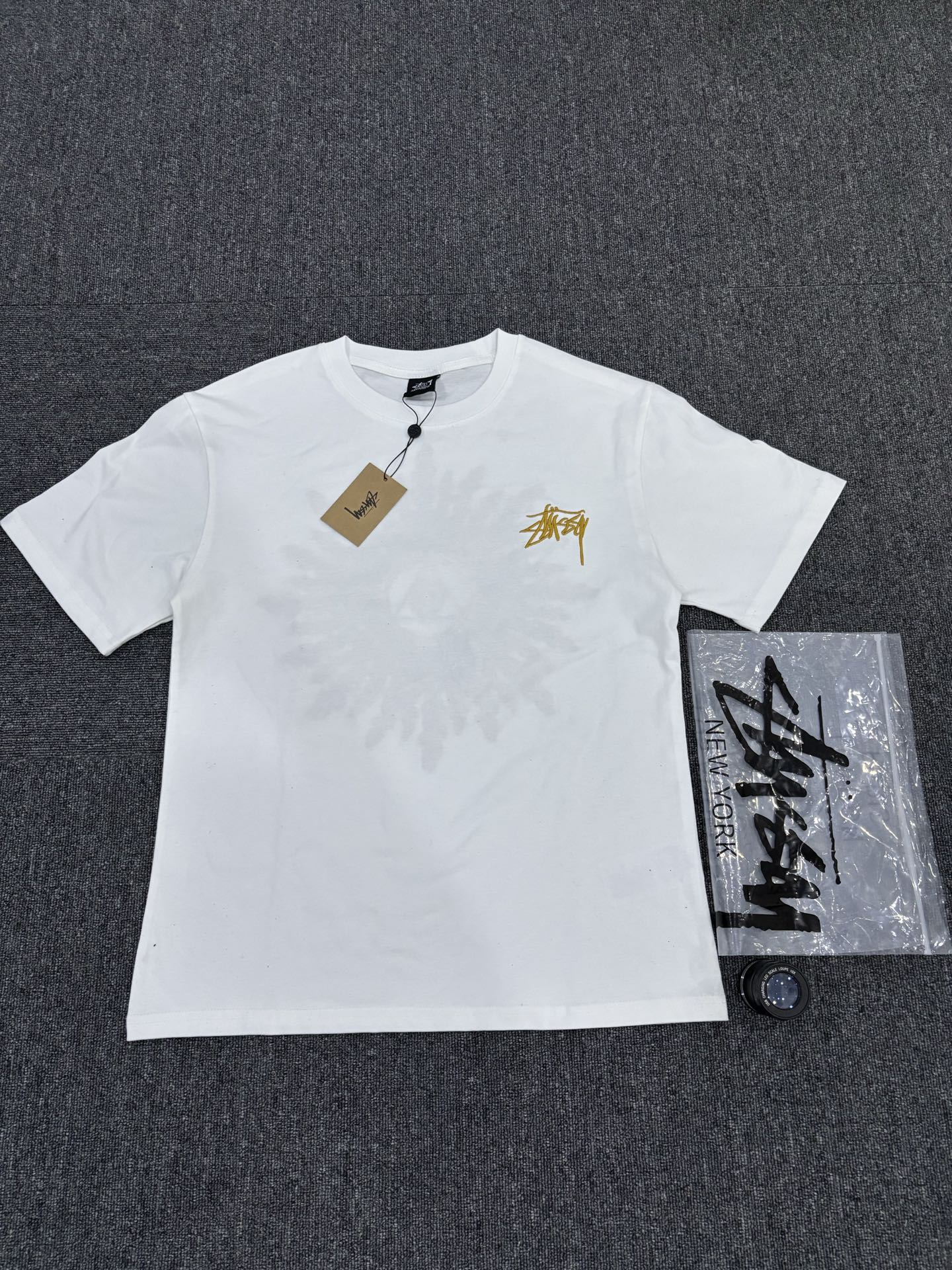 Stüssy White T-Shirt with Gold Chest Logo & Back Graphic